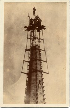 A postcard of men working on Wakefield Cathedral spire A postcard of men working on Wakefield Cathedral spire